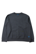 A dark charcoal gray crewneck sweatshirt with ribbed cuffs and hem, laid flat against a solid white background. A small blue tag is visible on the lower right hem.