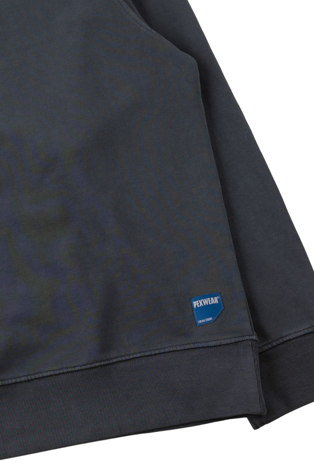 Close-up of a dark charcoal gray sweatshirt sleeve with a ribbed cuff, featuring a small blue PEXWIAR brand patch on the lower cuff.