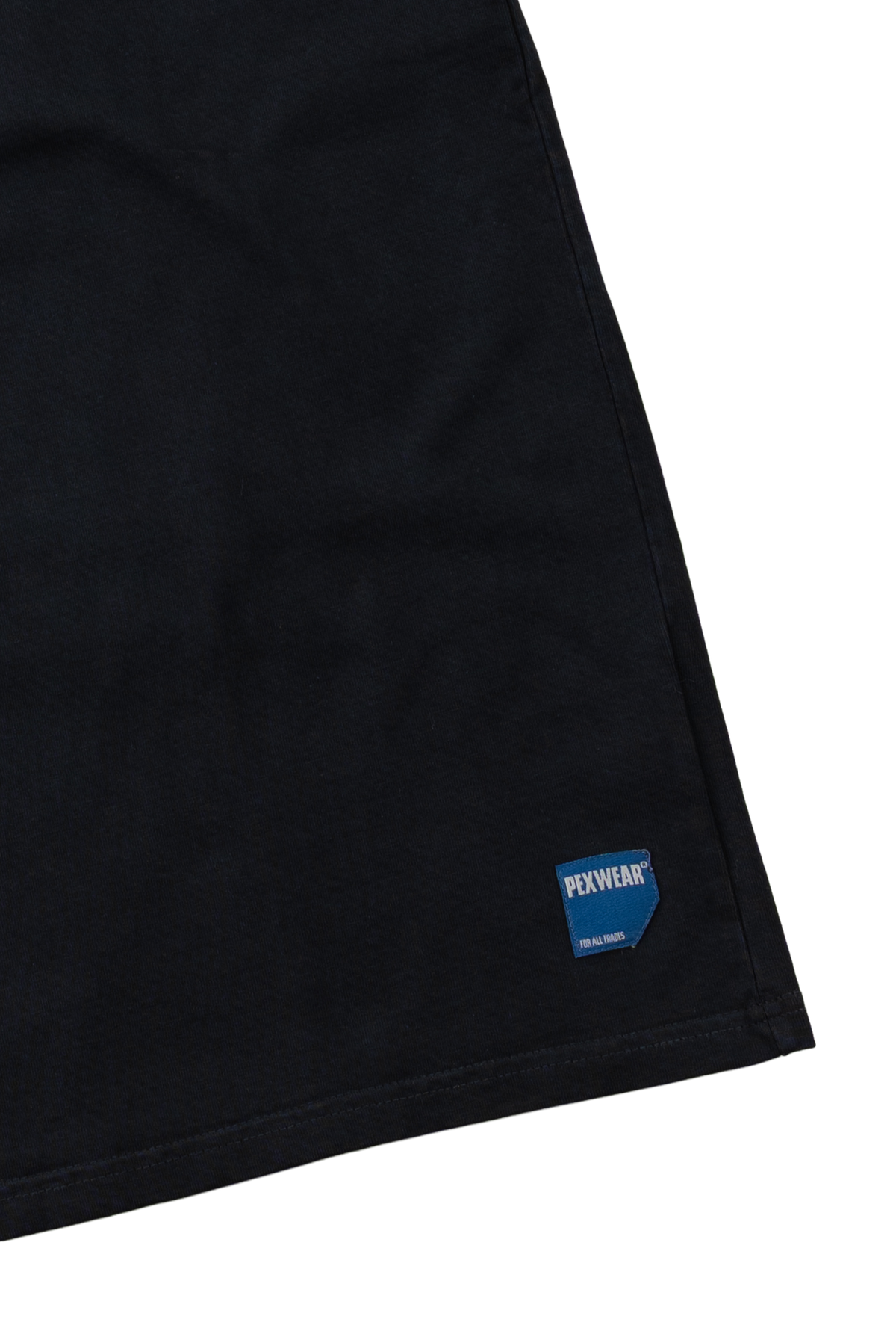 Close-up of a black garment corner with a small blue and white FENWEAR logo patch near the hem, shown against a white background.